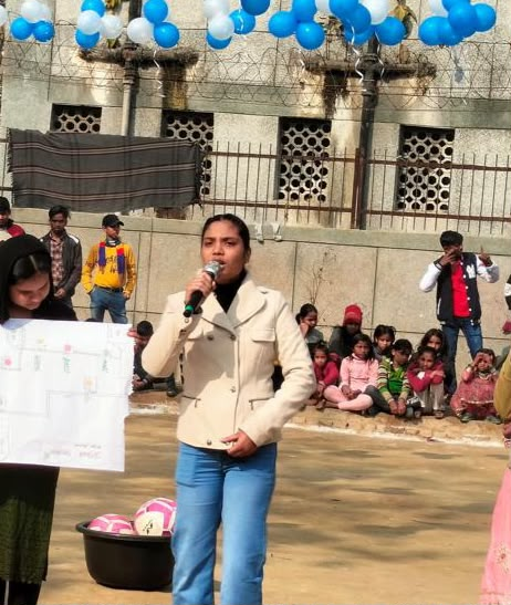 Neha speaking at a TeamUp community event