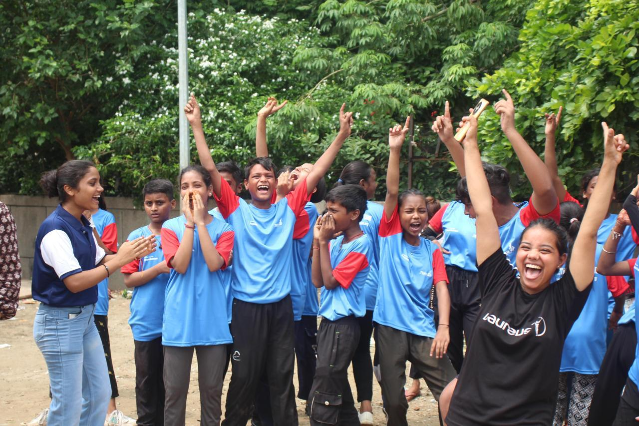 TeamUp participants celebrating together during a community sports session